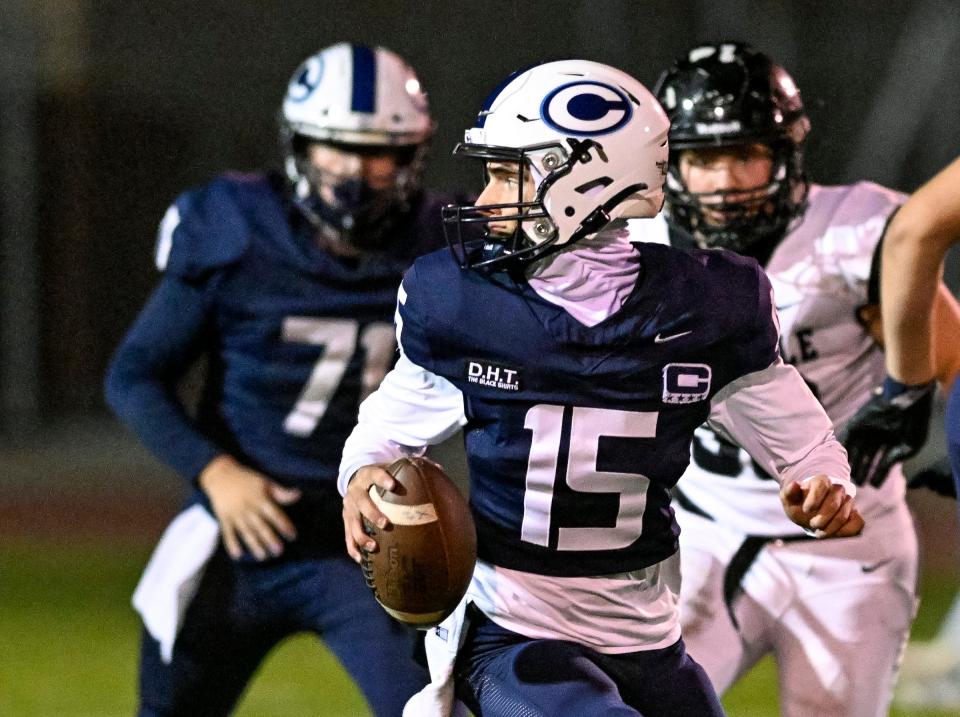 Central Valley Christian's Brent Kroeze looks o pass against Stockdale in a Central Section Division II high school football playoff on Friday, November 3, 2023.