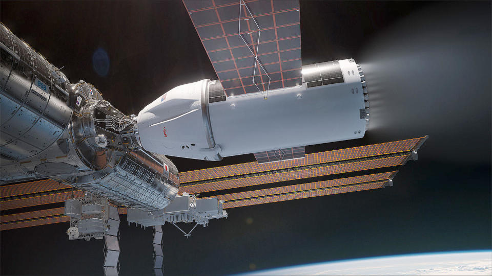 An artist's rendering of SpaceX's ISS Detachment Vehicle pushing the lab toward a controlled re-entry and breakup in the 2030 timeframe, following the formal decision to retire the lab complex after three decades of operation.  / Credit: SpaceX