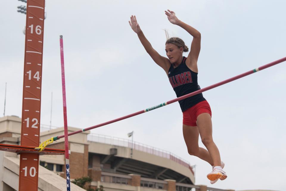 Ballinger’s Jillian Halfmann lets go of the pole after clearing 11 feet at the Class 3A state meet.