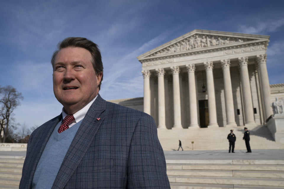 Mitch Hungerpiller of Birmingham, Ala., who invented a computerized system to automate the processing of returned mail, visits the Supreme Court in Washington, on Feb. 14, 2019, where his decade-long fight with the post office over patent infringement will be heard. (AP Photo/J. Scott Applewhite)