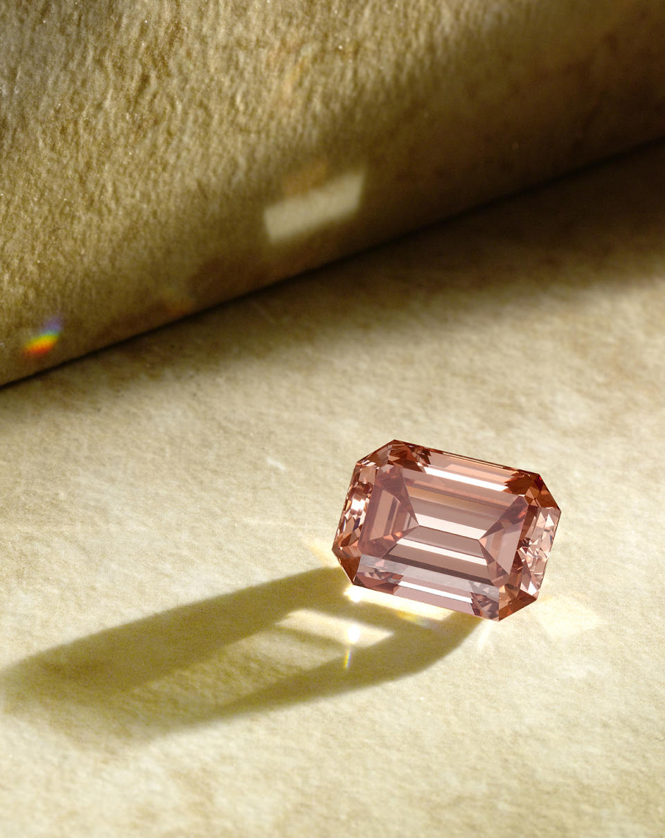 A 12-carat fancy deep brownish pinkish orange diamond ring
