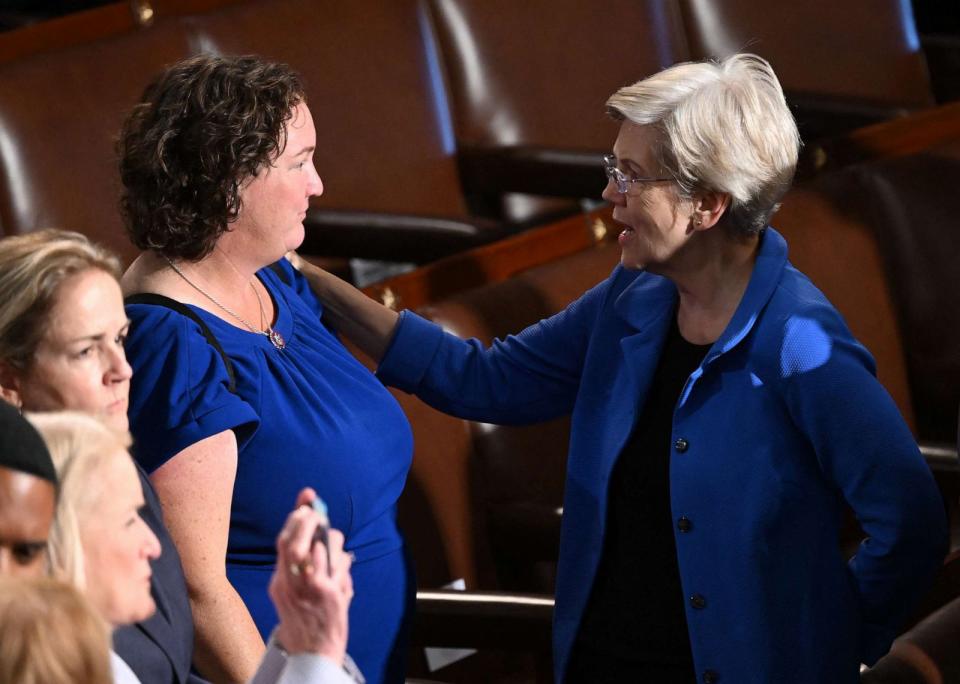 PHOTO: Senator Elizabeth Warren, right, speaks with Representative Katie Porter before Israeli President Isaac Herzog addresses a Joint Meeting of Congress in the House Chamber of the Capitol in Washington on July 19, 2023. (Saul Loeb/AFP via Getty Images)