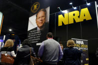 <p>People sign up at the booth for the National Rifle Association (NRA) at the Conservative Political Action Conference (CPAC) at National Harbor, Md., Feb. 23, 2018. (Photo: Joshua Roberts/Reuters) </p>