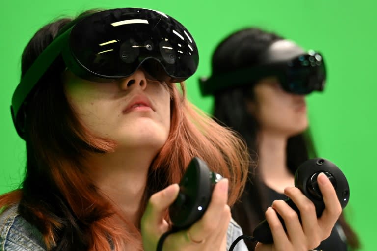 Students at the Hong Kong University of Science and Technology use virtual reality headsets in class (Peter PARKS)