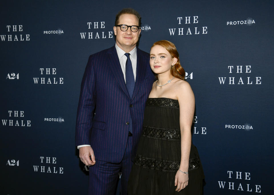 Actors Brendan Fraser, left, and Sadie Sink attend the premiere of "The Whale" at Alice Tully Hall on Tuesday, Nov. 29, 2022, in New York. (Photo by Evan Agostini/Invision/AP)