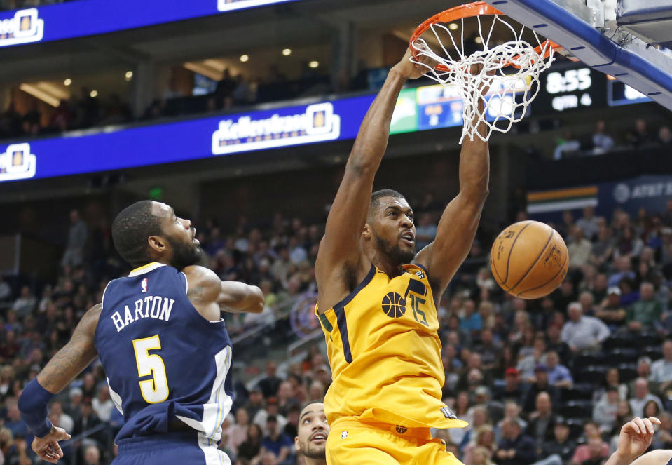 Derrick Favors throws one down against the Nuggets on Tuesday. (AP)