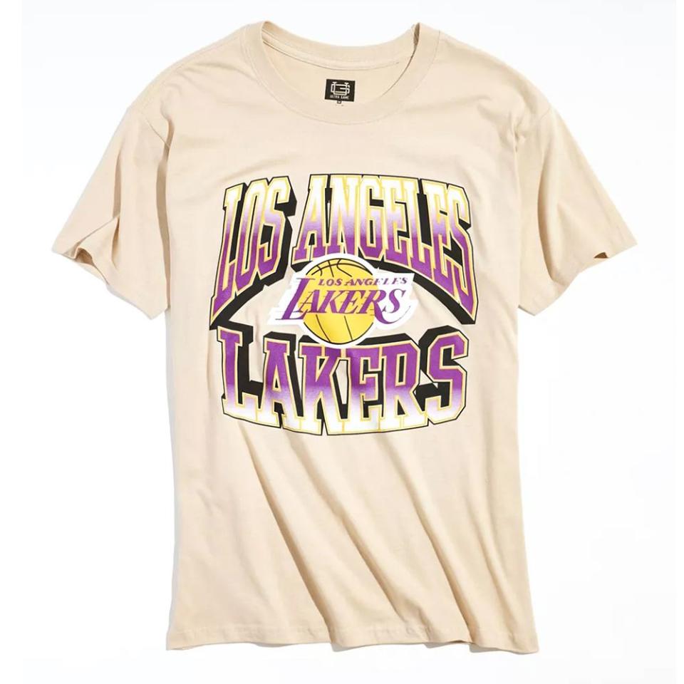 <p><a href="https://go.redirectingat.com?id=74968X1596630&url=https%3A%2F%2Fwww.urbanoutfitters.com%2Fshop%2Fultra-game-los-angeles-lakers-big-logo-tee&sref=https%3A%2F%2Fwww.biography.com%2Factors%2Fg43827527%2Fpedro-pascal-vintage-lakers-tee%2F" rel="nofollow noopener" target="_blank" data-ylk="slk:Shop Now;elm:context_link;itc:0;sec:content-canvas" class="link ">Shop Now</a></p><p>Los Angeles Lakers Big Logo Tee</p><p>$39.00</p><p>urbanoutfitters.com</p>