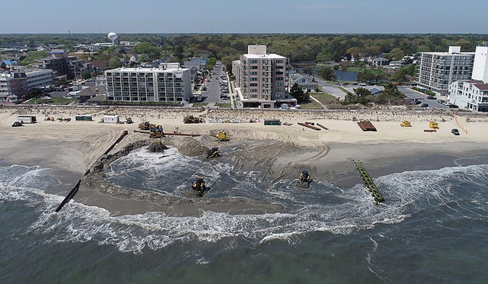 An aerial view of beach replenishment work being done at Rehoboth Beach on Thursday April 20, 2023.