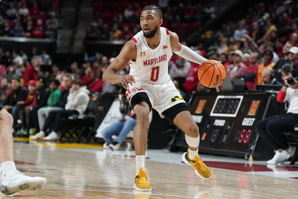 Maryland guard Don Carey (0) dribbles the ball during the second half of the team's NCAA college basketball game against UMBC on Thursday, Dec. 29, 2022, in College Park, Md. Maryland won 80-64. (AP Photo/Jess Rapfogel)