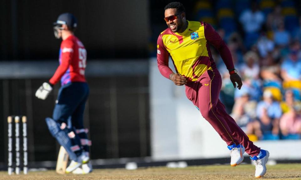 <span class="element-image__caption">Fabian Allen (right) celebrates the dismissal of England’s Tom Banto.</span> <span class="element-image__credit">Photograph: Randy Brooks/AFP/Getty Images</span>