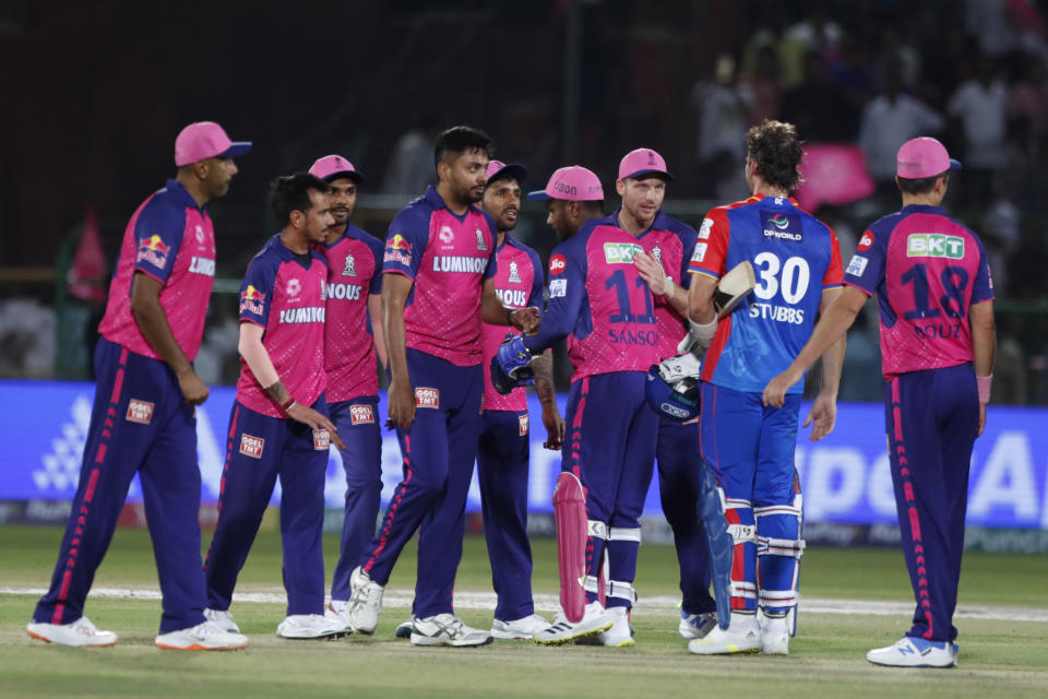 Delhi Capitals' Tristan Stubbs waits to greet the Rajasthan Royals players as they celebrate their team's victory over Delhi Capitals during the Indian Premier League cricket match between Delhi Capitals and Rajasthan Royals in Jaipur, India, Thursday, March 28, 2024. (AP Photo/Pankaj Nangia)