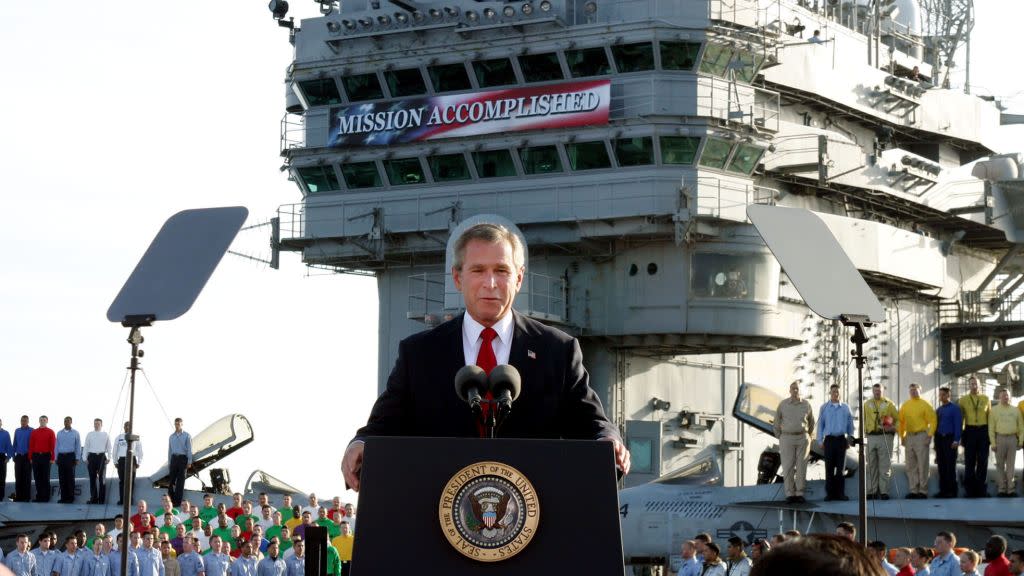 ** FILE ** President Bush declares the end of major combat in Iraq as he speaks aboard the aircraft carrier USS Abraham Lincoln off the California coast, in this May 1, 2003 file photo. Democratic congressional leaders on Tuesday, May 1, 2007 sent Iraq legislation setting timetables for U.S. troop withdrawals to President George W. Bush and a certain veto. On the fourth anniversary of the president's "Mission Accomplished" speech, Senate Majority Democratic Leader Harry Reid said that Bush "has put our troops in the middle of a civil war. A change of course is needed."