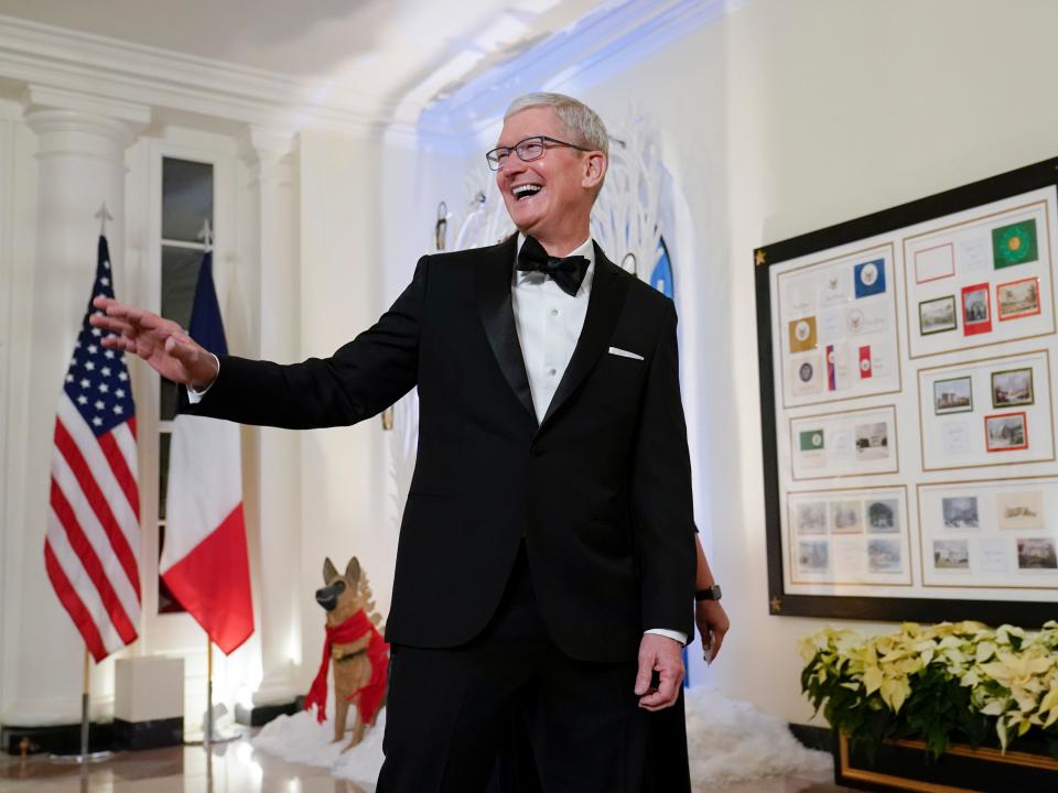 Apple CEO Tim Cook arrives for the State Dinner with President Joe Biden and French President Emmanuel Macron at the White House in Washington, Thursday, Dec. 1, 2022.