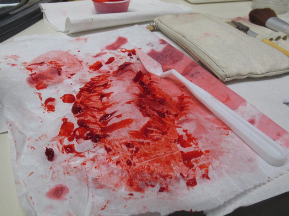 Fake blood, gelatin and food coloring, is shown in a dressing room at Morey's Piers on the Wildwood N.J. boardwalk on Sept.27, 2012 before it is applied to the faces of actors portraying zombies. The boardwalk is adapting some of its summertime rides to a Halloween theme to try to extend the tourist season as long as possible. (AP Photo/Wayne Parry)