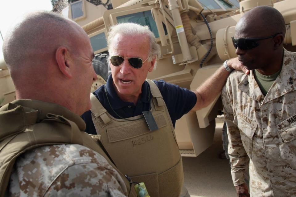 <div class="inline-image__caption"><p>"Senator Joseph Biden speaks U.S. Marine generals during a visit to Ramadi, Iraq September 6, 2007."</p></div> <div class="inline-image__credit">John Moore/Getty</div>