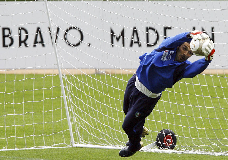 FILE - Italian national team goalkeeper Gianluigi Buffon in action during a training session in Carnago, near Milan, Italy, on June 4, 2007. At age 45 and after a career that included a World Cup title with Italy, a long list of trophies with Juventus and many years when he was considered among the best goalkeepers in soccer, Gianluigi Buffon announced his retirement on Wednesday, Aug. 2, 2023. (AP Photo/Alberto Pellaschiar)