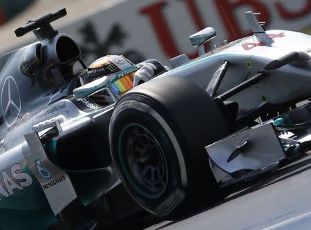 Mercedes Formula One driver Lewis Hamilton of Britain drives during the third practice session of the Hungarian F1 Grand Prix at the Hungaroring circuit, near Budapest, July 26, 2014. REUTERS/Bernadett Szabo