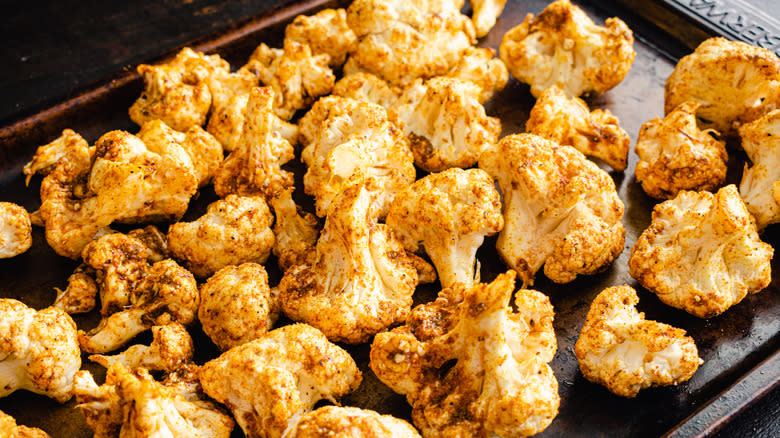 Cauliflower on tray with seasoning 