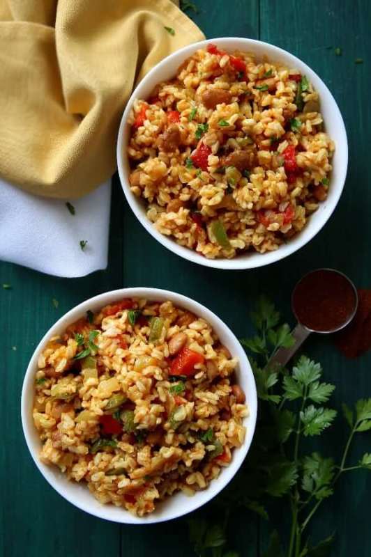 <p>Vegan in the Freezer</p><p>This Spanish brown rice and beans is made with healthy brown rice and it also has the perfect combo of vegetables and spices that will elevate any Mexican-style meal.</p><p><strong>Get the recipe: <a href="https://veganinthefreezer.com/spanish-rice-with-pinto-beans-recipe/" rel="nofollow noopener" target="_blank" data-ylk="slk:Spanish Rice and Beans;elm:context_link;itc:0;sec:content-canvas" class="link ">Spanish Rice and Beans</a></strong></p>