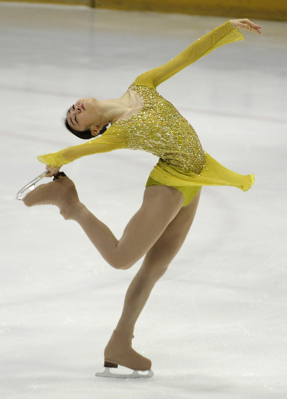 Vancouver Olympics women's figure skating gold medalist Kim Yu-na performs in the women's short skating of the Korea National Figure Skating Championships in Goyang, South Korea, Saturday, Jan. 4, 2014. (AP Photo/Song Kyung-seok, Pool)