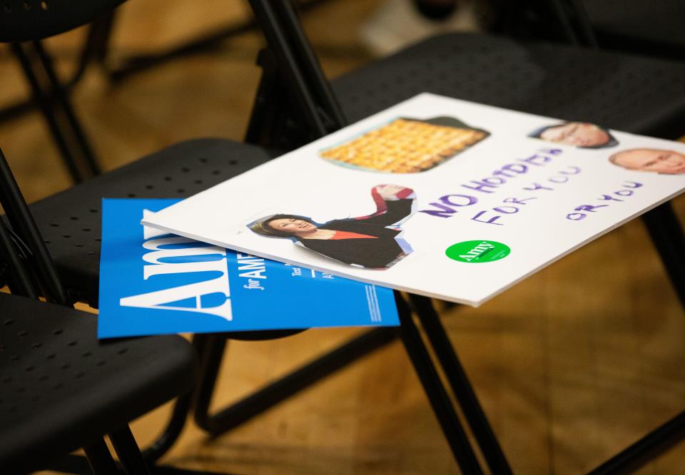 Supporters left signs as they were compelled to leave after protestors took over the stage forcing Democratic presidential hopeful Minnesota Senator Amy Klobuchar to cancel her rally before it even started on March 1, 2020 in St. Louis Park, west of Minneapolis, Minnesota. - Hundreds of Klobuchar supporters witnessed a group of Black Lives Matter protesters demanding her to drop out of the race after her misshandling of Myon Burrell's case in 2002 when she was County Attorney. (Photo by Kerem Yucel / AFP) (Photo by KEREM YUCEL/AFP via Getty Images)