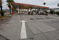 An empty TotalEnergies gas station that is running out of fuel is seen in Nice