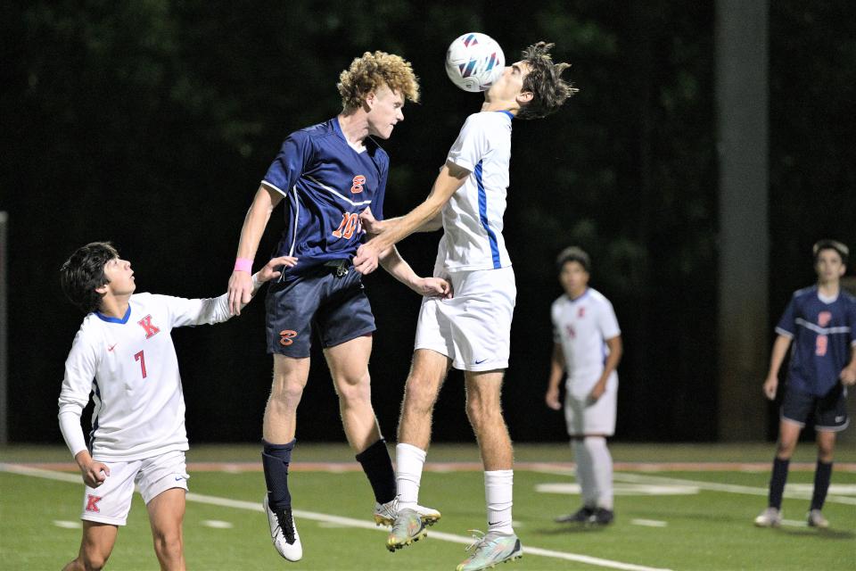 Benjamin's Ford Cash heads the ball toward a Lions defender during the Bucs' district semifinals. Cash played an important role in the win, notching a goal and an assist in the match (Jan. 27, 2023).