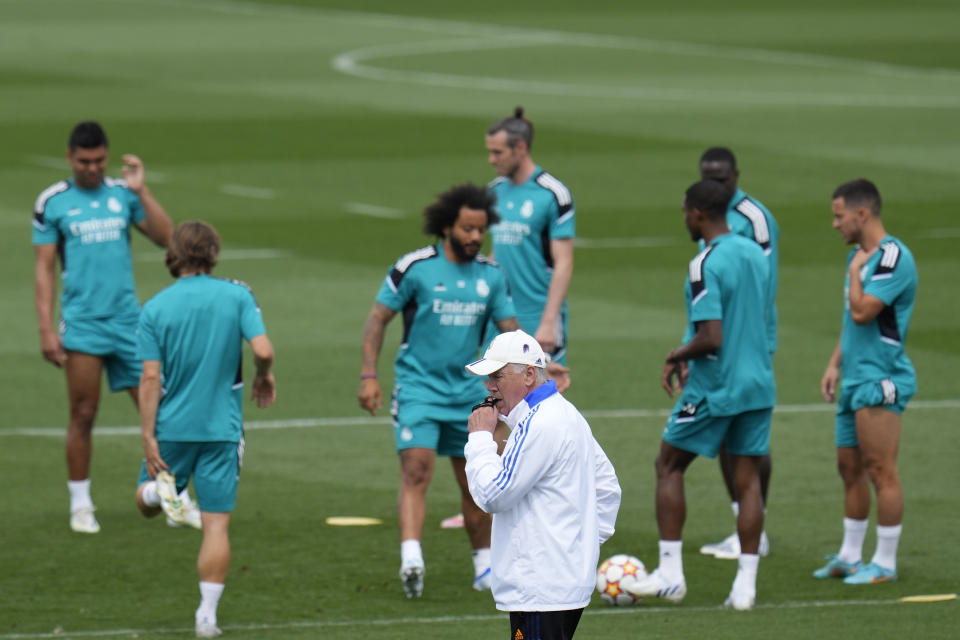 Real Madrid's head coach Carlo Ancelotti blows his whistle during a Media Opening day training session in Madrid, Spain, Tuesday, May 24, 2022. Real Madrid will play Liverpool in Saturday's Champions League soccer final in Paris. (AP Photo/Manu Fernandez)