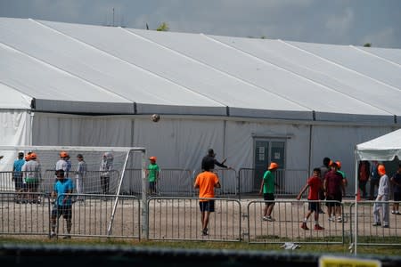 Children who have been incarcerated by Homeland Security are housed in tents in Homestead