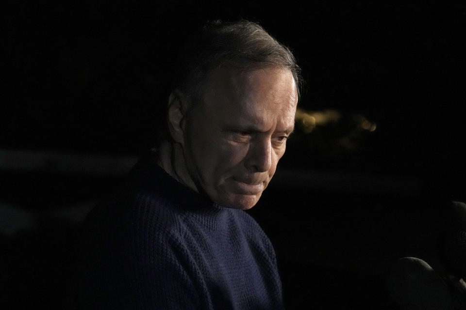 Uri Raanan listens to a reporter's question outside his Bannockburn, Ill., home after his daughter Natalie and her mother Judith Raanan were released by Hamas, Friday, Oct. 20, 2023. (AP Photo/Charles Rex Arbogast)