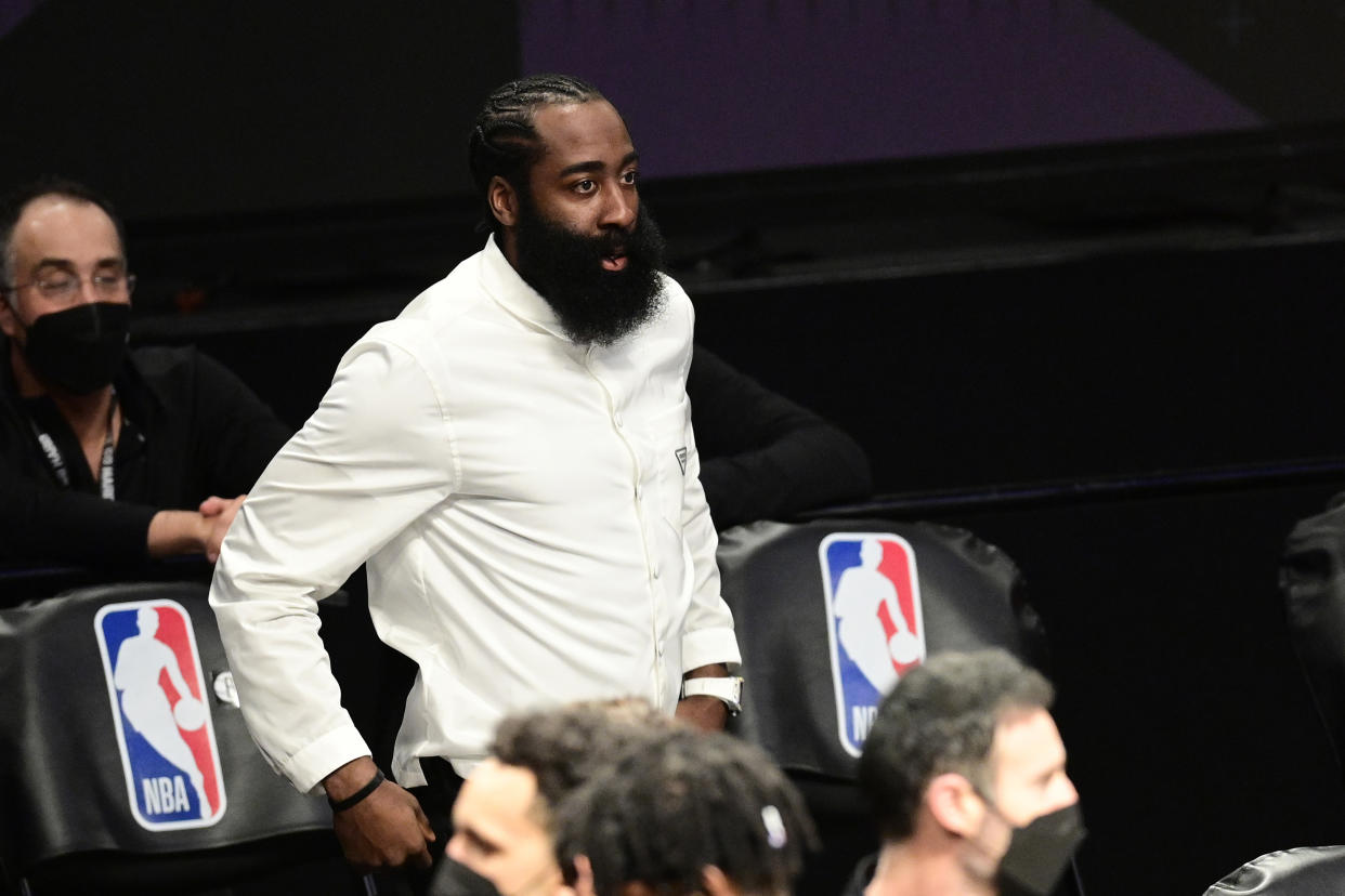 NEW YORK, NEW YORK - JUNE 07:  James Harden #13 of the Brooklyn Nets looks on from the sideline against the Milwaukee Bucks in Game Two of the Second Round of the 2021 NBA Playoffs at Barclays Center on June 07, 2021 in New York City. NOTE TO USER: User expressly acknowledges and agrees that, by downloading and or using this photograph, User is consenting to the terms and conditions of the Getty Images License Agreement. (Photo by Steven Ryan/Getty Images)