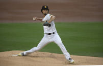 San Diego Padres starting pitcher Yu Darvish delivers during the first inning of a baseball game against the Colorado Rockies, Monday, May 17, 2021, in San Diego. (AP Photo/Denis Poroy)