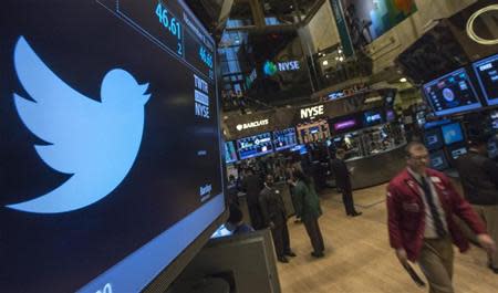 The Twitter logo is displayed on the floor of the New York Stock Exchange, November 8, 2013. REUTERS/Brendan McDermid