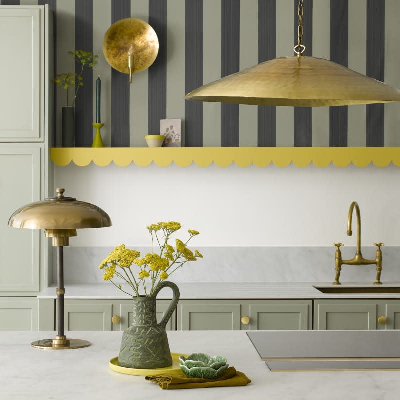 Gold metallic lighting, gray and charcoal stripes on half wall with yellow scallop shelf