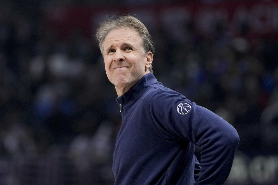 Washington Wizards interim coach Brian Keefe reacts during the first half of the team's NBA basketball game against the Los Angeles Clippers, Friday, March 1, 2024, in Los Angeles. (AP Photo/Ryan Sun)