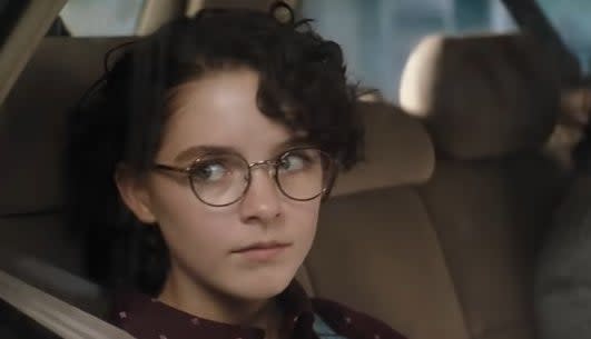 Phoebe sitting in a car in "Ghostbusters: Afterlife"