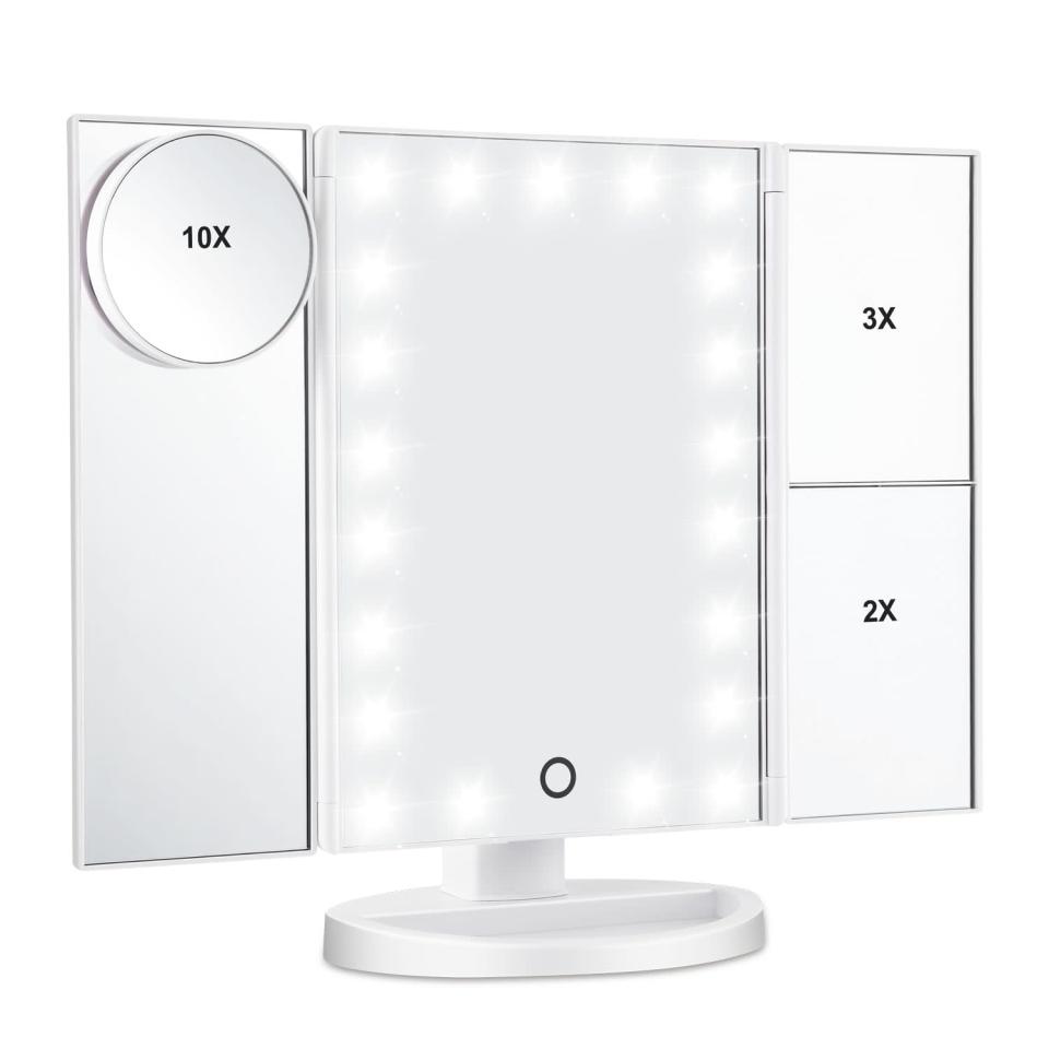 <p>Doing your makeup will feel easier than ever with the <span>LED Lighted Makeup Mirror</span> ($31). It features 21 LED bulbs and three different magnification options.</p>