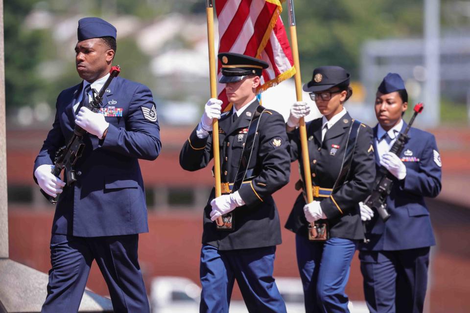 Delaware National Guard joint honor guard present colors during a Memorial Day Ceremony Monday, May 30, 2022 at War Memorial Plaza in New Castle.