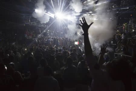 Spring breakers dance at a club in Cancun March 7, 2015. REUTERS/Victor Ruiz Garcia