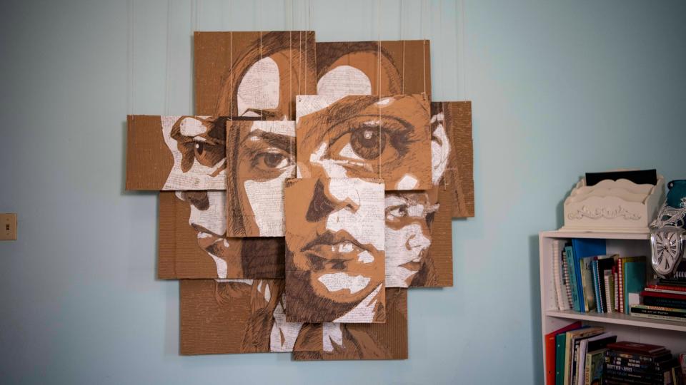 Anya Benninger created this self portrait on panels of cardboard after discovering that Donald Foose, the pastor who baptized her, had been jailed for molesting a teen girl. She said the artwork is meant to represent that truth "has to shatter things before it can bring them back together."