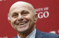 University of Chicago professor Eugene F. Fama smiles at a news conference after it was announced he won the 2013 Nobel Prize in Economics in Chicago, October 14, 2013. REUTERS/Jim Young