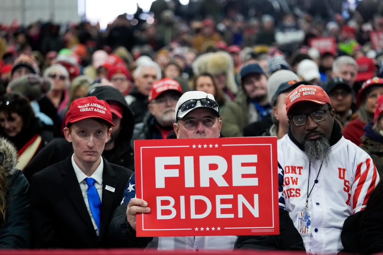 Supporters arrive before Republican presidential candidate former President Donald Trump speaks at an election rally in Waterford, Mich., Saturday, Feb. 17, 2024.