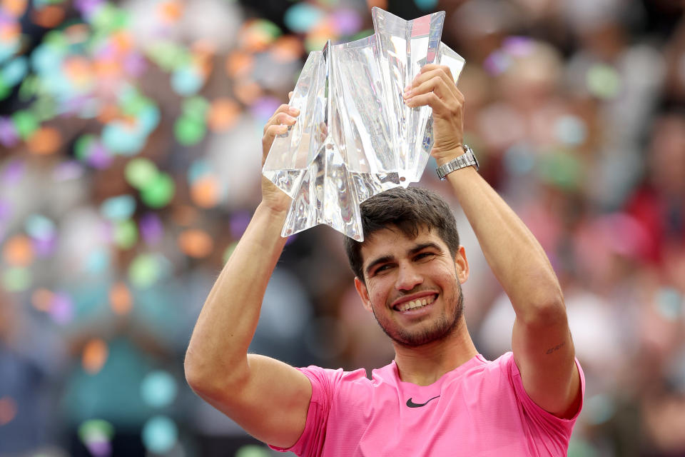 INDIAN WELLS, CALIFORNIA - MARCH 19: Carlos Alcaraz of Spain poses with the trophy after defeating Daniil Medvedev of Russia during the Men's Final of the BNP Paribas Open at the Indian Wells Tennis Garden on March 19, 2023 in Indian Wells, California. (Photo by Matthew Stockman/Getty Images)