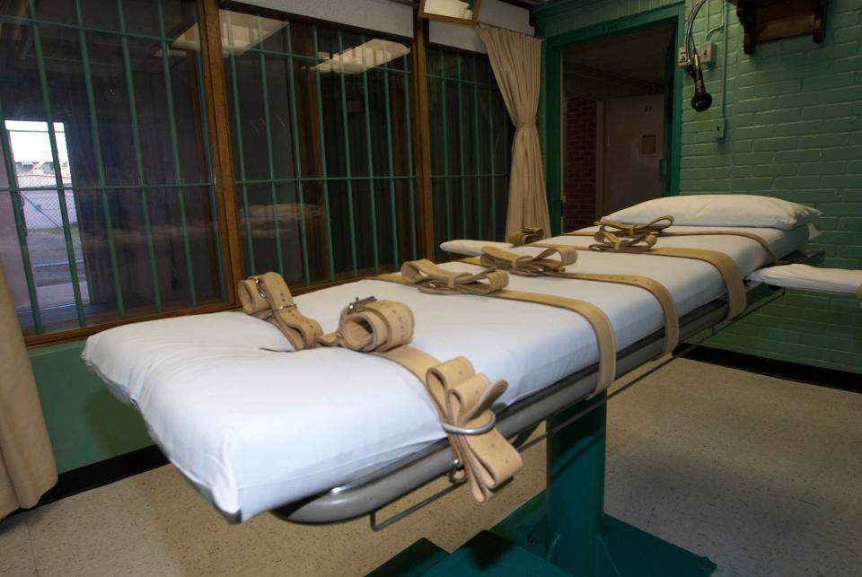 The death chamber and the steel bars of the viewing room seen at the Texas State Penitentiary in Huntsville on Sept. 29, 2010, where 41-year-old Ramiro Gonzales is set to be executed on Wednesday.