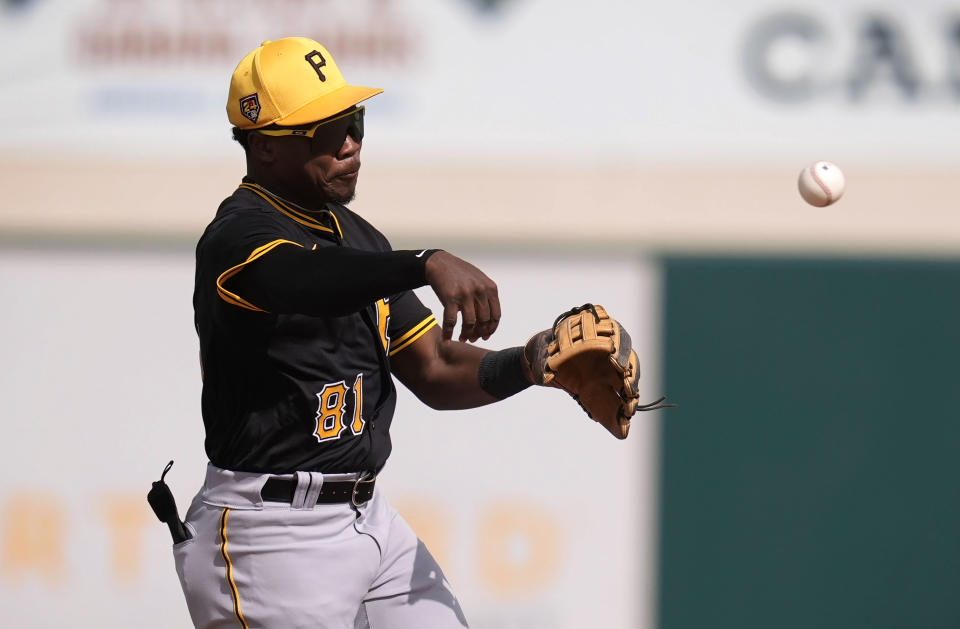 Pittsburgh Pirates second baseman Termarr Johnson throws to first base during the sixth inning of a spring training baseball game against the Detroit Tigers Saturday, March 9, 2024, in Lakeland, Fla. (AP Photo/Charlie Neibergall)