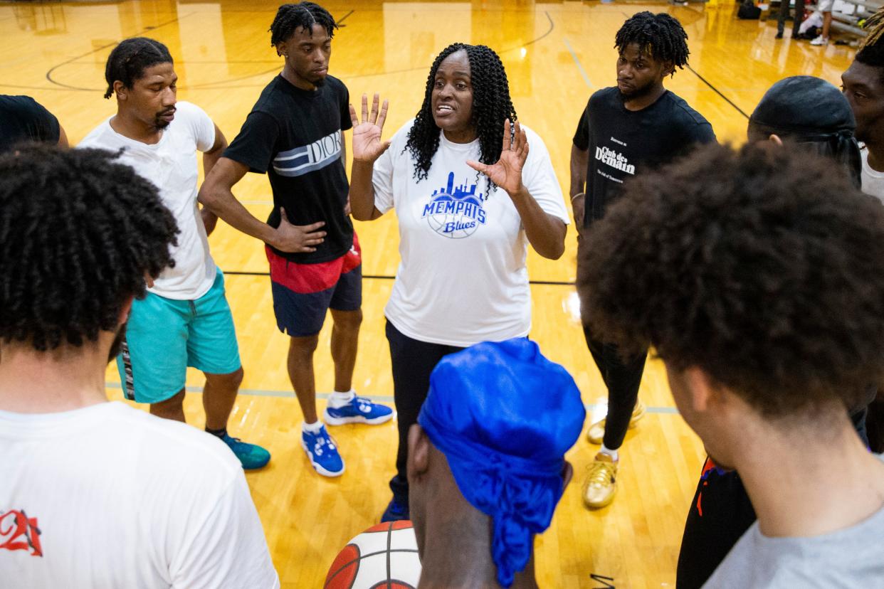 Alondray Rogers speaks to players in a huddle during a practice for Memphis Blues, a semi-pro basketball team Rogers owns and coaches, at Penny’s Gym in Memphis, Tenn., on Monday, April 1, 2024. The team offers a chance for area basketball players to extend their careers after college with hopes of landing on a professional team whether in the U.S. or abroad.