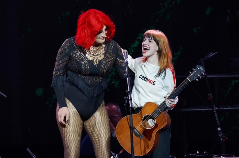 NASHVILLE, TENNESSEE - MARCH 20: Hayley Williams (R) performs onstage during the Love Rising: Let Freedom Sing (and Dance) A Celebration Of Life, Liberty And The Pursuit Of Happiness show at Bridgestone Arena on March 20, 2023 in Nashville, Tennessee. (Photo by Jason Kempin/Getty Images)