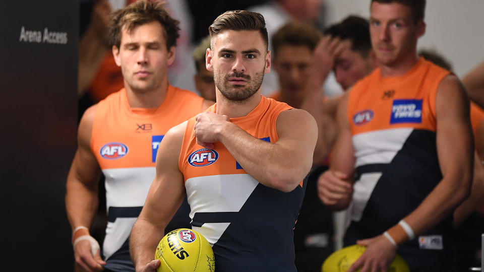 Stephen Coniglio, pictured here leading the Giants out for their match against Carlton. 