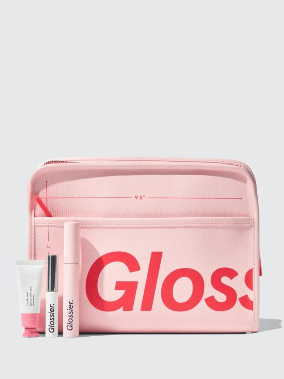 <p><strong>Glossier</strong></p><p>Glossier</p><p><strong>$48.00</strong></p><p><a href="https://fave.co/3cBxhNB" rel="noopener" target="_blank" data-ylk="slk:Shop Now;elm:context_link;itc:0;sec:content-canvas" class="link ">Shop Now</a></p><p>There's no such thing as too much merch, especially from a brand we love. Along with getting your beauty fix with Cloud Paint, Boy Brow, and Lash Slick, this holiday set comes with a travel bag that has a coated cotton exterior to prevent stains from water splashes.</p>