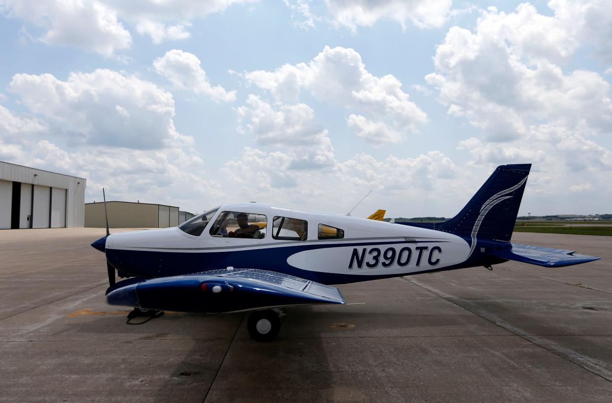 A plane in OTC color with the tail number November-three-niner-zero-Tango-Charlie parks after landing at the Springfield-Branson National Airport. Students in OTC's new aviation program will train in this plane and others.